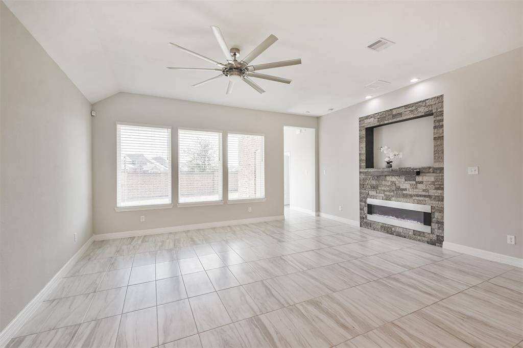 Stone fireplace with beautiful led fireplace.