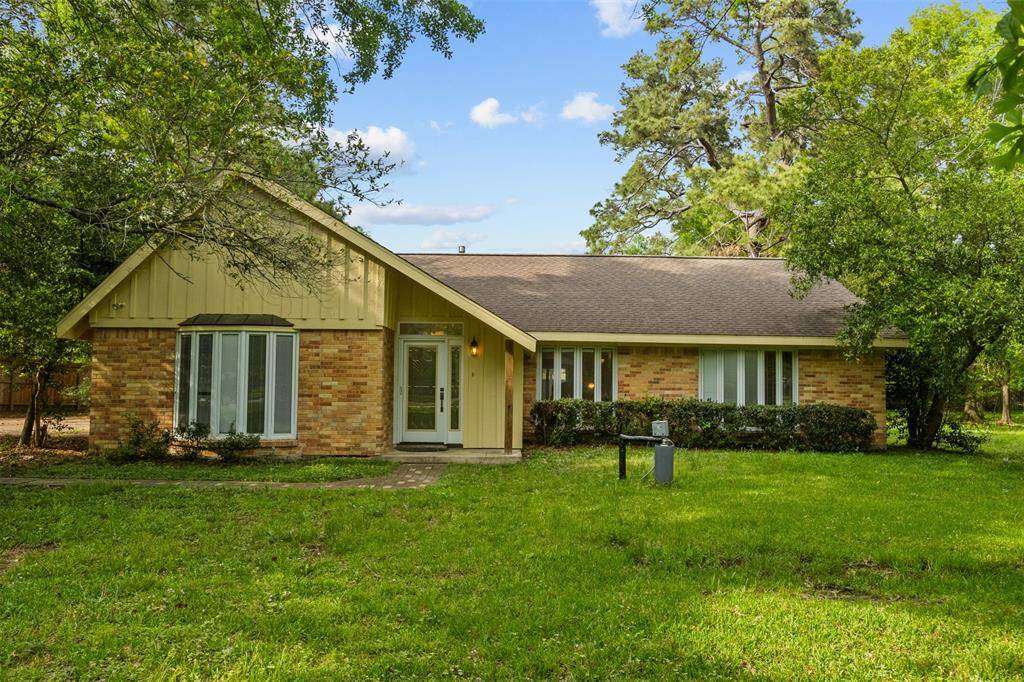 Ranch style 1 story home located on 1.1 acre lot. Mature trees surrounding the home.