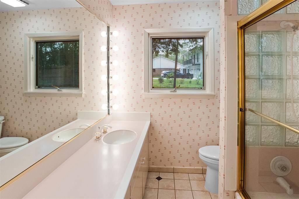 Secondary bath with tub shower combo.
