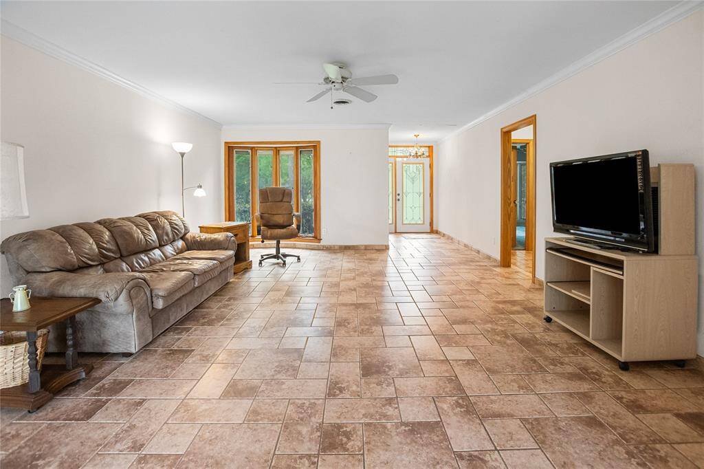 Tile flooring thourghout den and breakfast area.