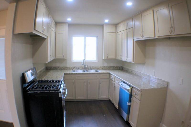 GRANITE COUNTERTOPS AND NEW CABINET FACES
