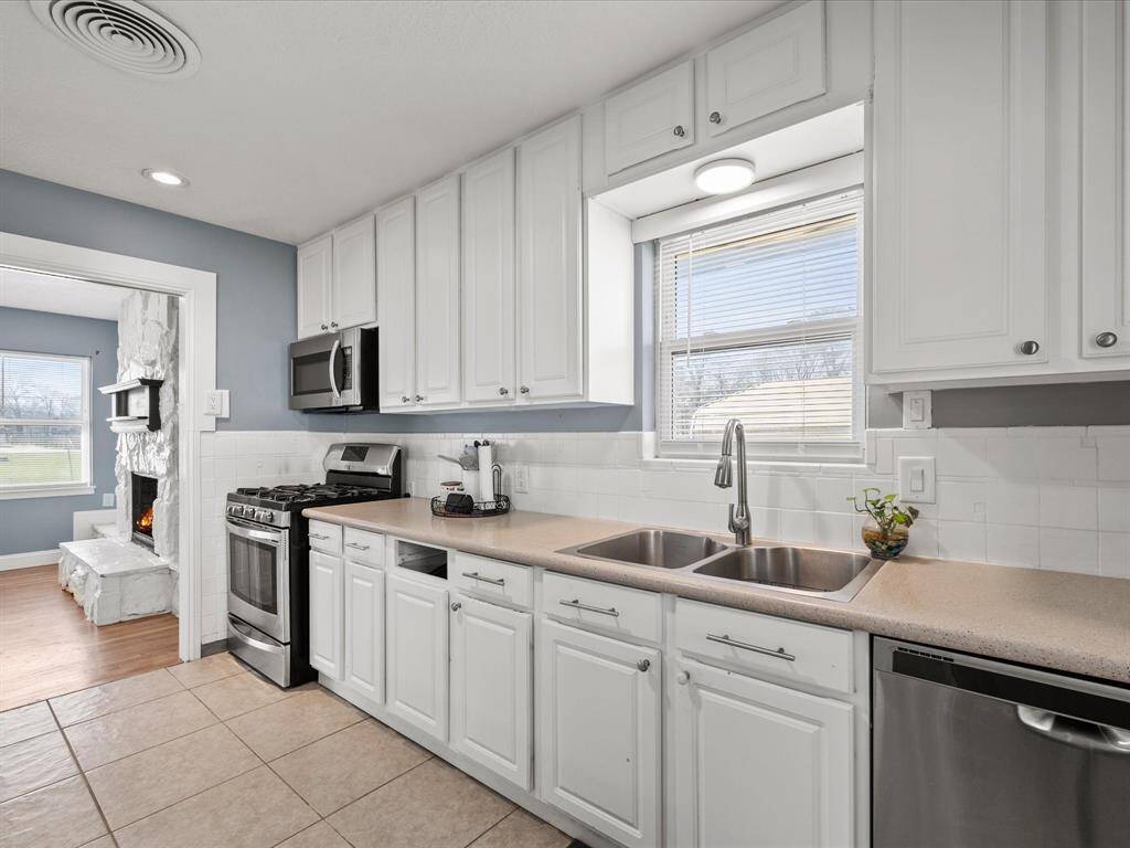 Kitchen with all stainless appliances