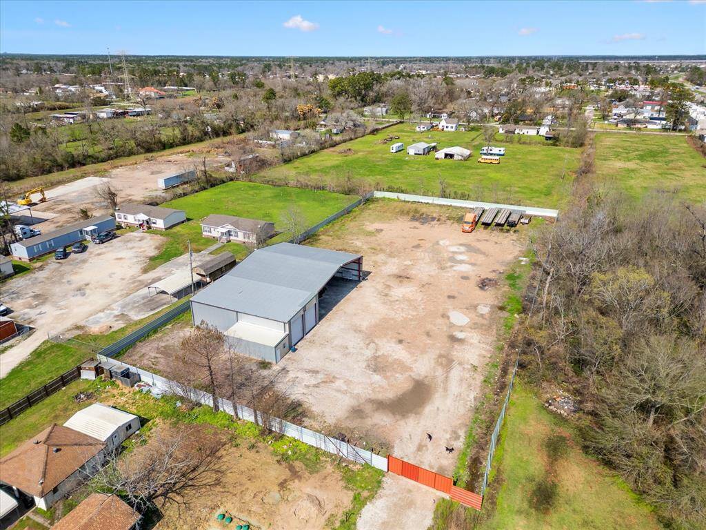 Over 2 Acres with shop in the rear portion