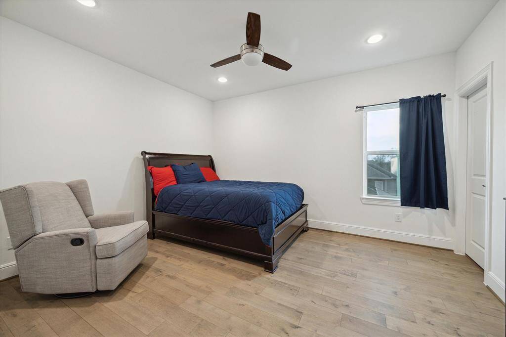 a 14x15 secondary bedroom located near the primary with private full bath. modern fixtures & LED lighting. large closet not seen in photo.