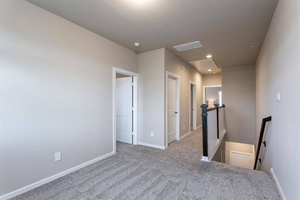 Extra Room at the top of the stairs could be used for a home office/study, game room, play area or media room.
