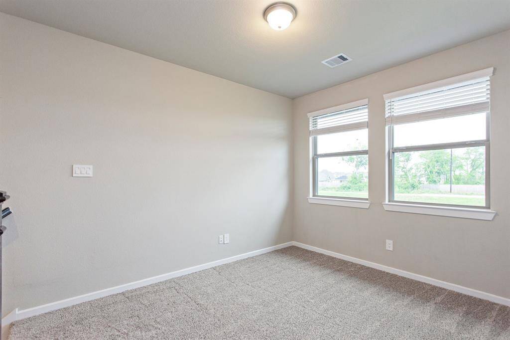Large windows in the Extra room at the top of the stairway.