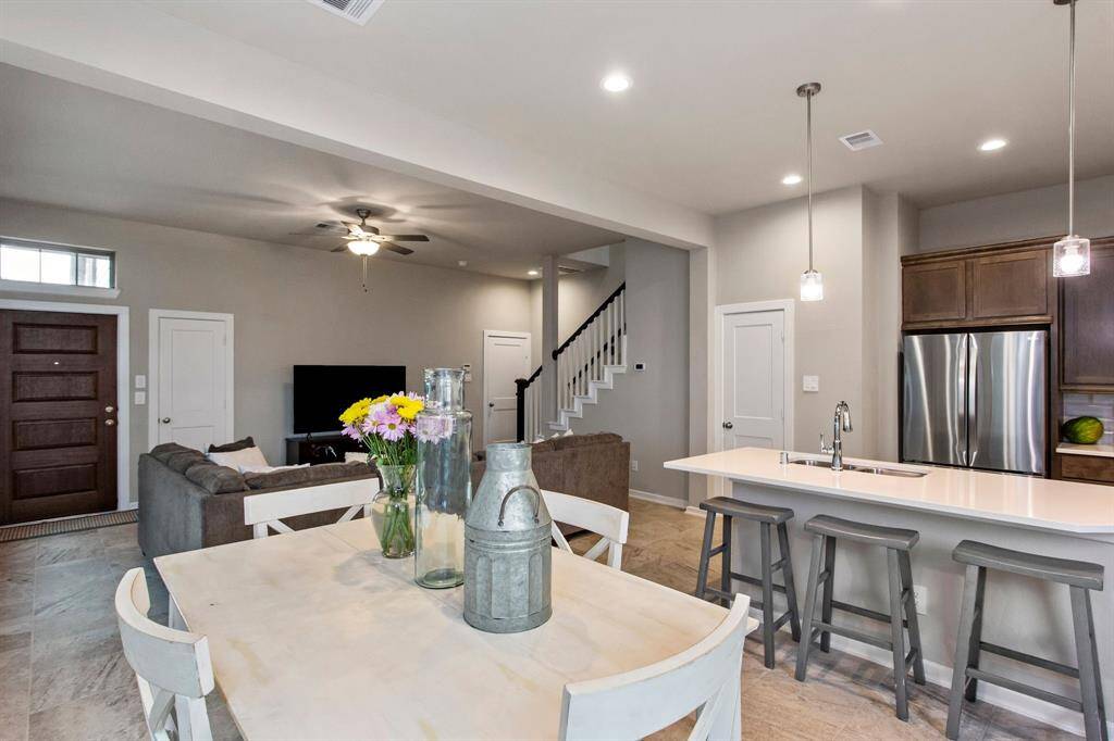 Plenty of room for a large breakfast table next to the kitchen.