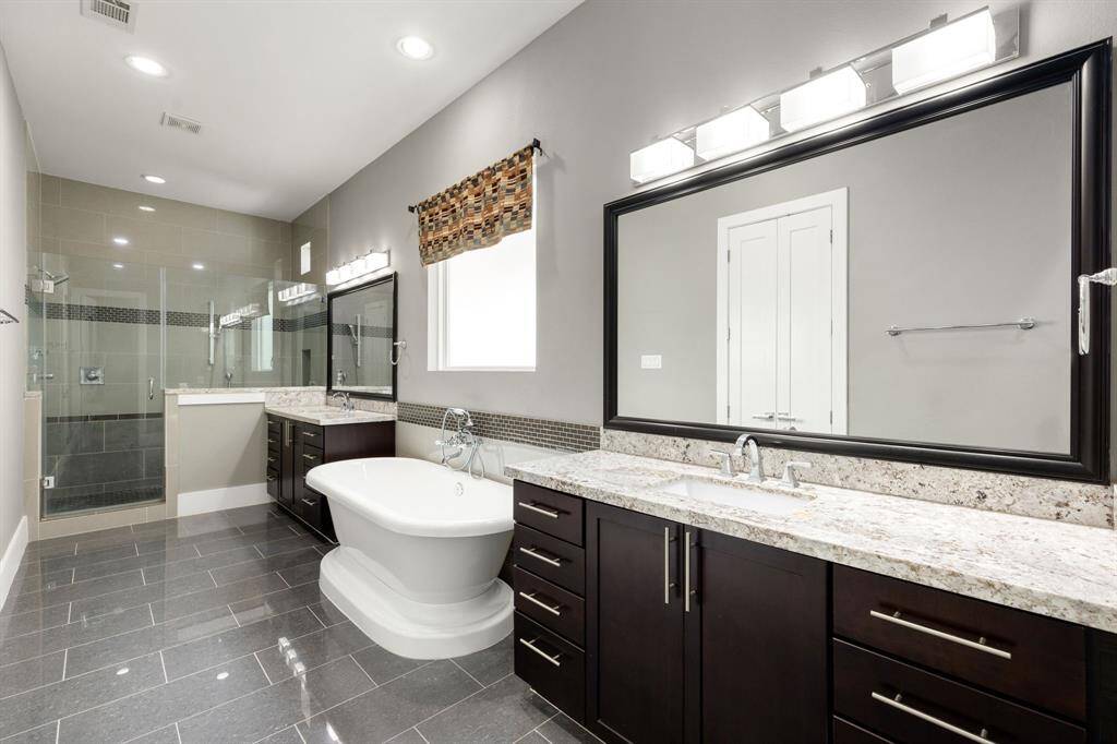 The primary bathroom is your perfect retreat.