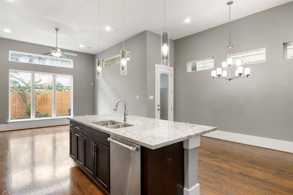 Inviting open floor plan where the dining, living, and kitchen areas are well defined yet naturally connected, creating the perfect space for conversation and entertaining.