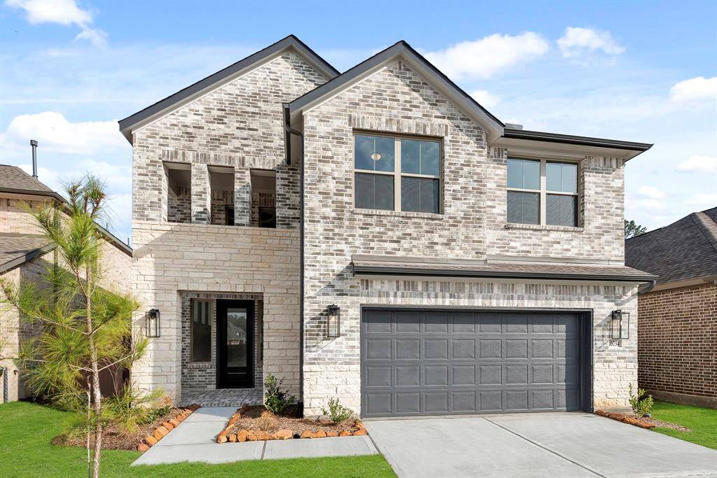 MOVE IN READY!! Westin Homes NEW Construction (Staten, Elevation A) Two story. 4 bedrooms. 2.5 baths. Green grass added to enhance photo.