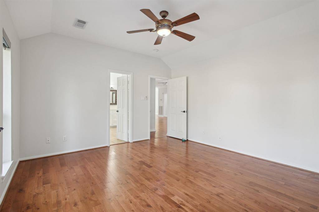 2nd view of primary bedroom.