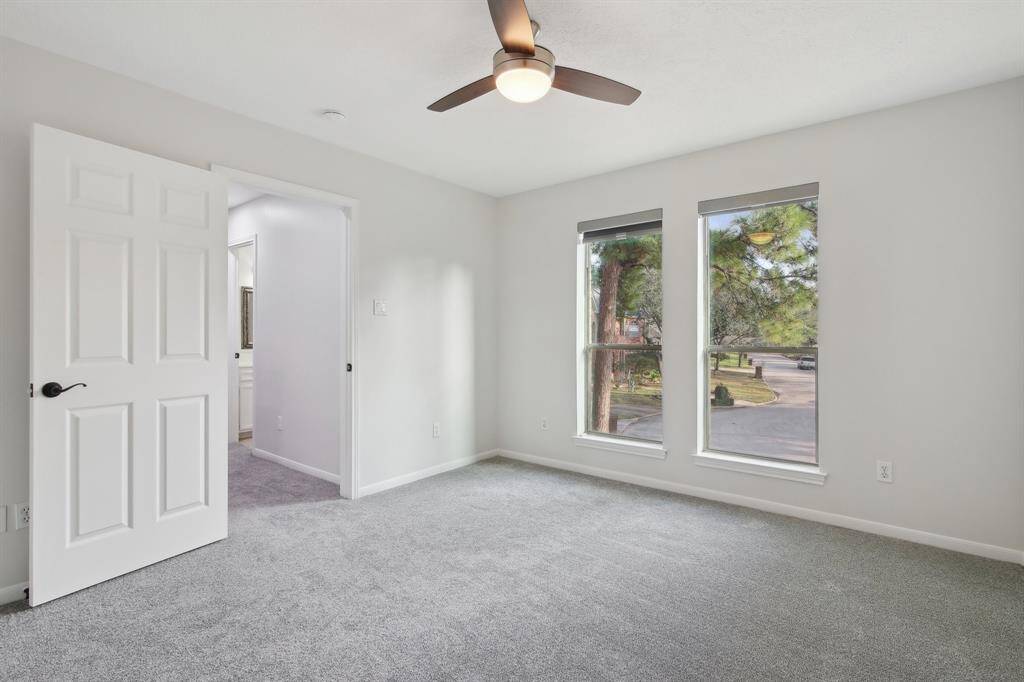 Bedroom 4 with large windows and natural light