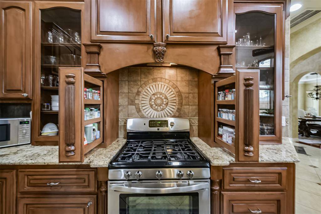 Double custom slide out spice rack.