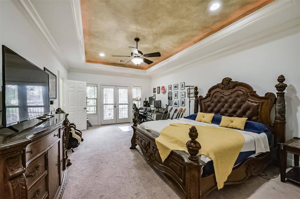Large master with beautiful ceilings.