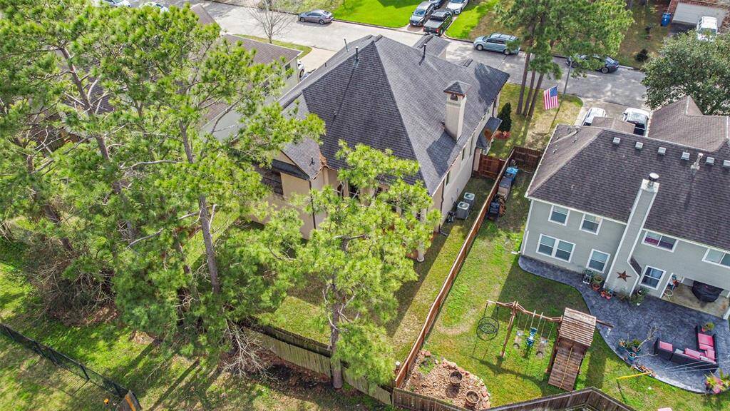 View of privacy and trees located behind  backyard.