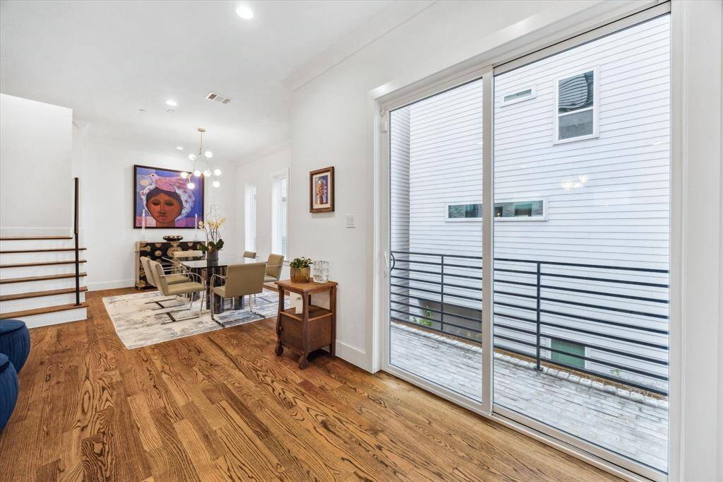 Second floor open concept features a great bricked balcony