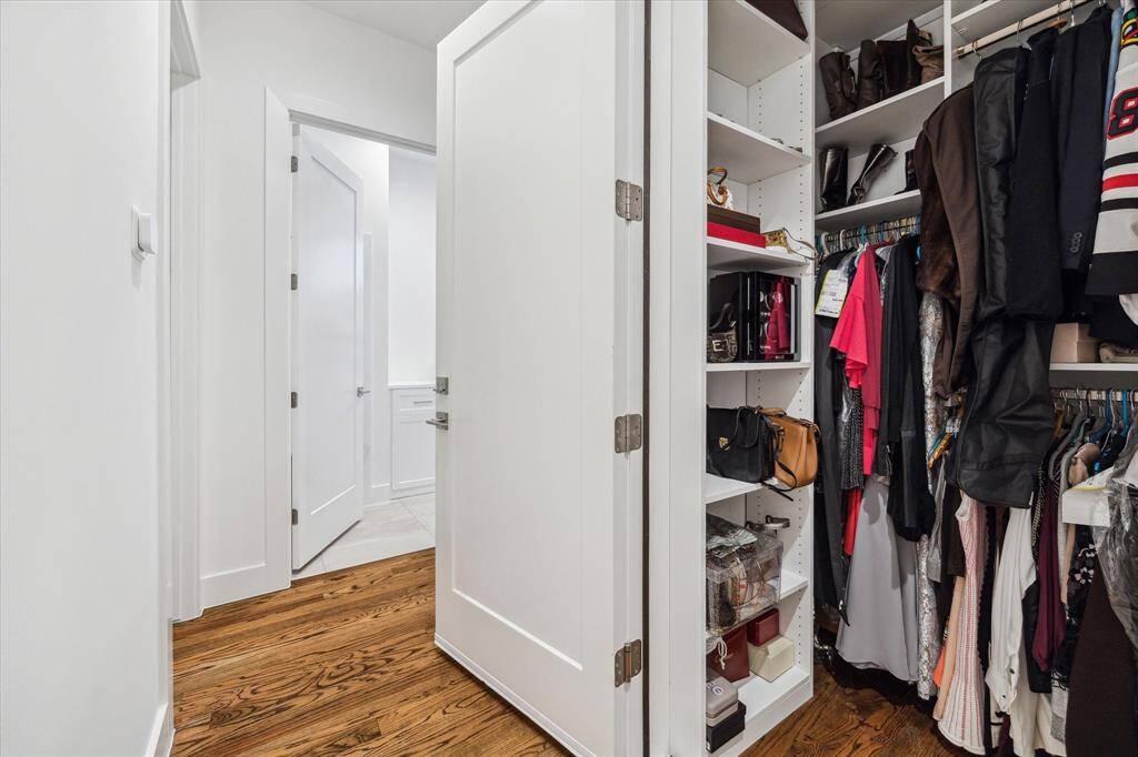 Third floor elevator prepped closet has built ins for an extra closet