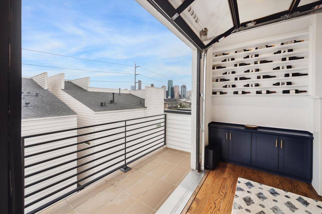 and a roll up door to enjoy the nice days and skyline views