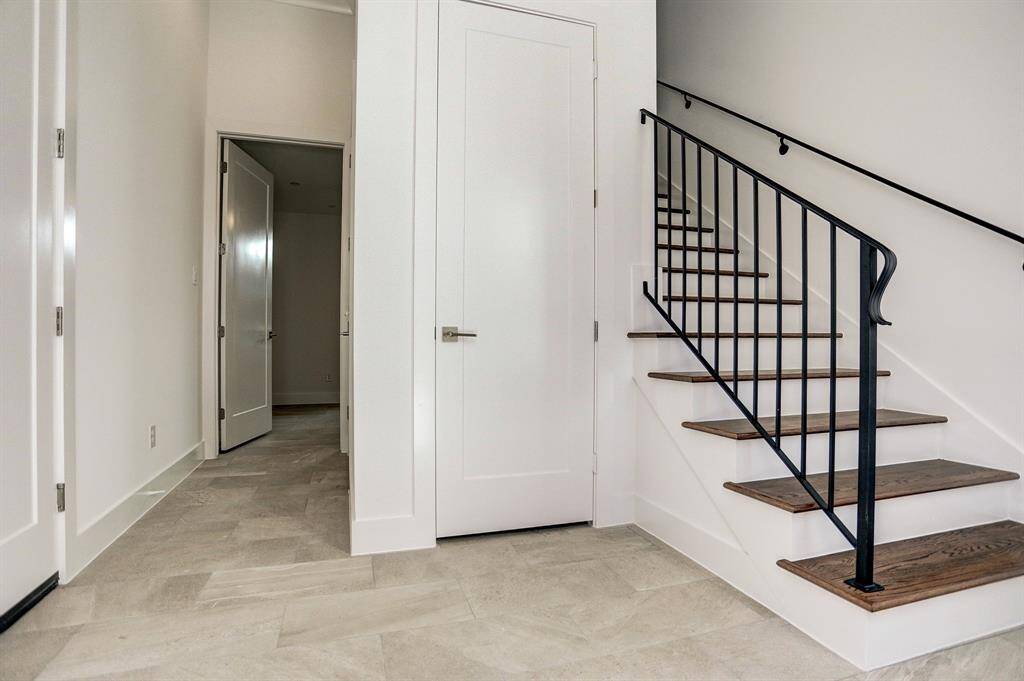 Welcoming entry features a coat closet and a great storage closet prepped for an elevator.