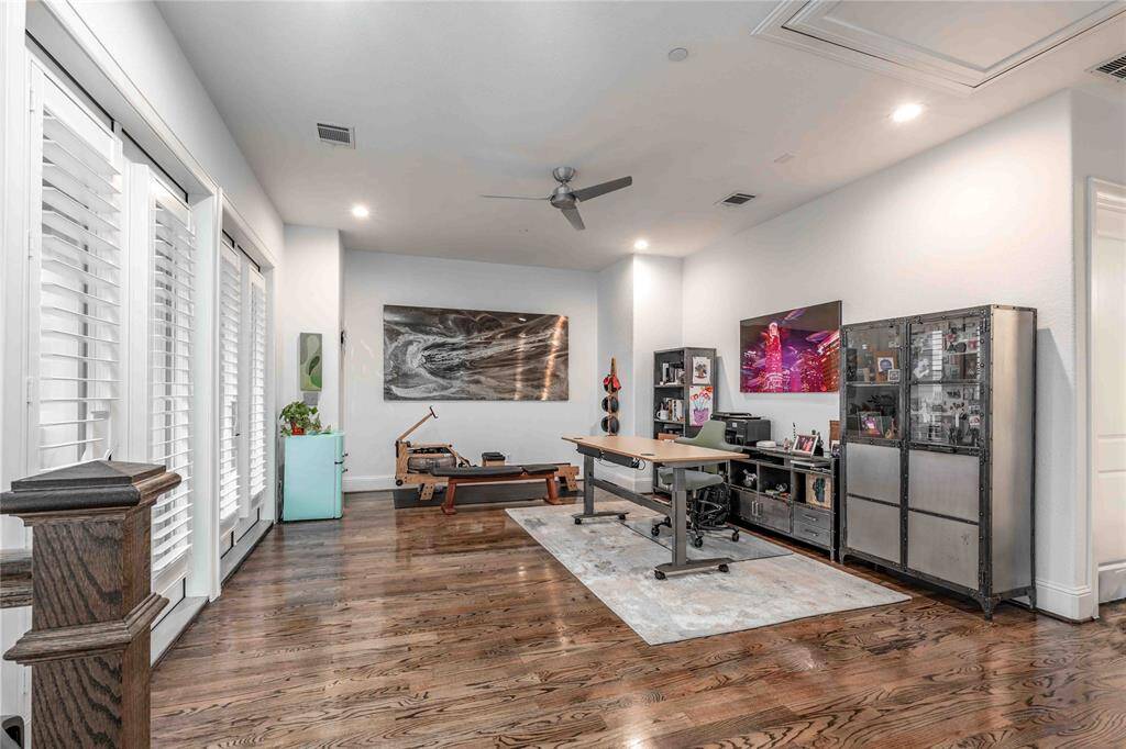 4th floor flex room can be used as a home gym. home office, 4th bedroom or media room.