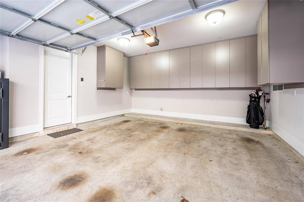 Garage has custom California Closet for additional storage.