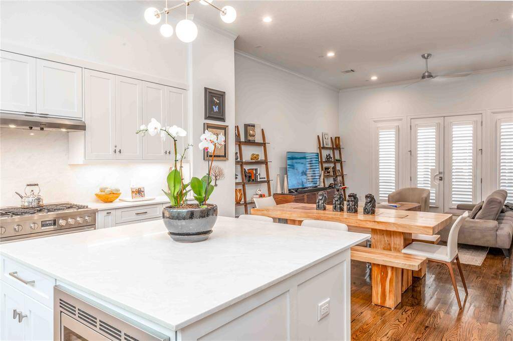Modern open-concept kitchen and living area.