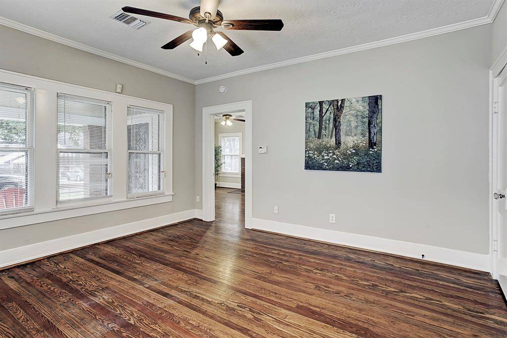 Spacious second suite down, all beds with large private closets & extra storage space