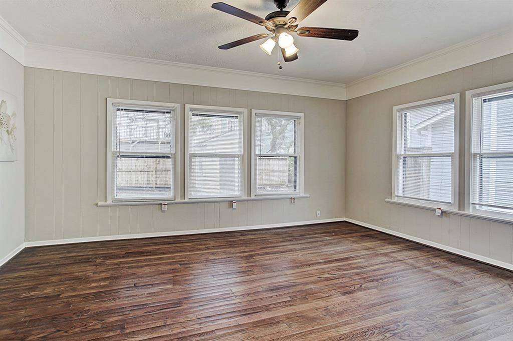 Fabulous suite down with original millwork, direct access to kitchen & backyard