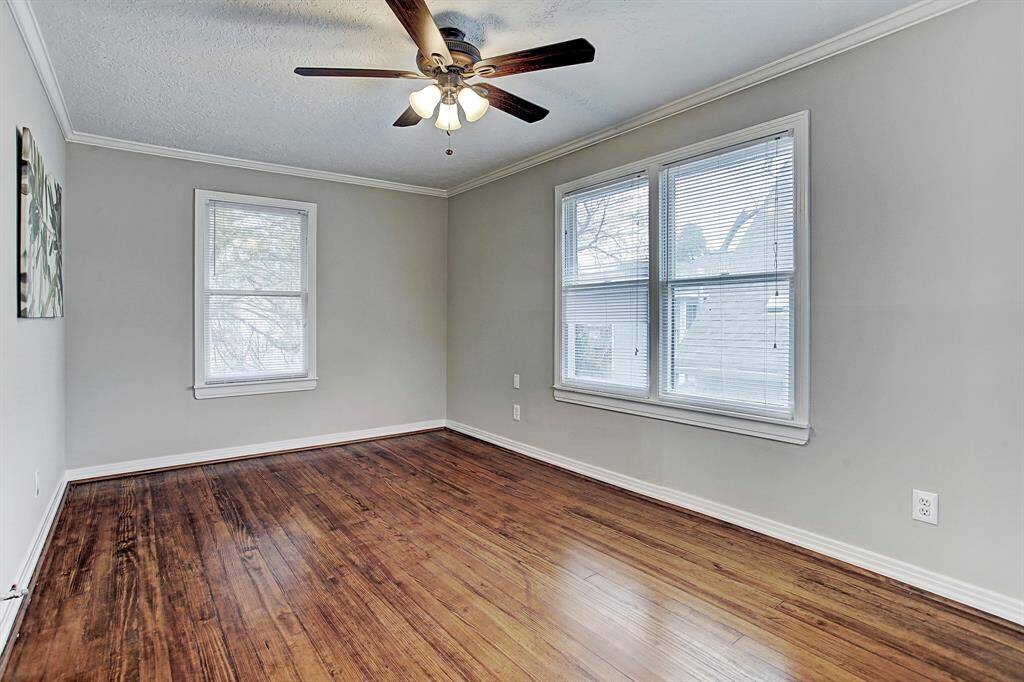 All bedrooms overlooking private backyard & quiet Kane street