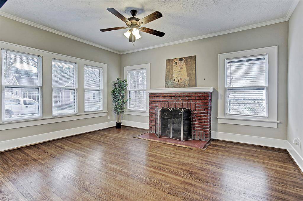 Cozy fireplace & lots of natural light from multiple windows