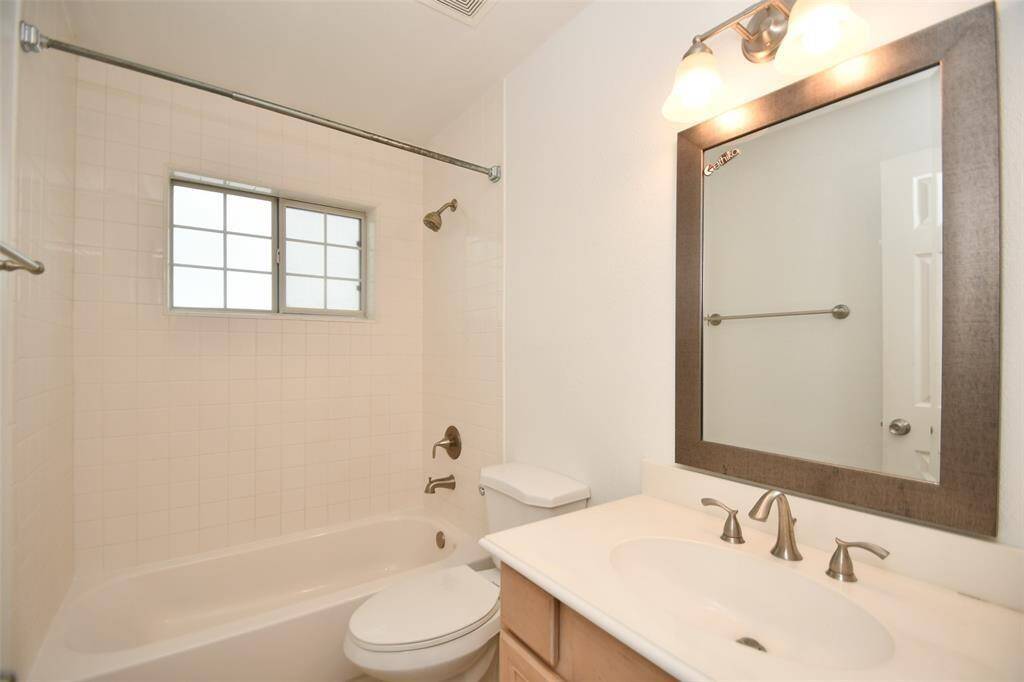 Bathrooms feature a convenient tub-shower combo.