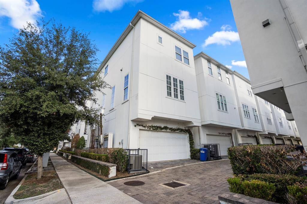 This street facing corner home gives easy access to the garage.