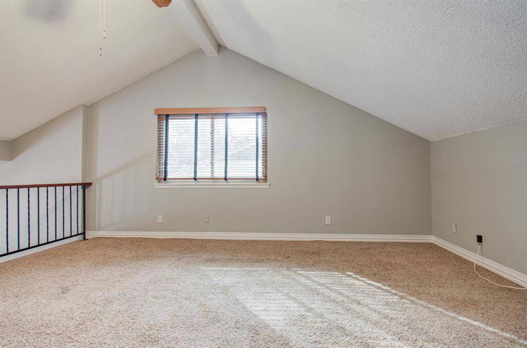 Stairs to Loft between entry and Wet Bar