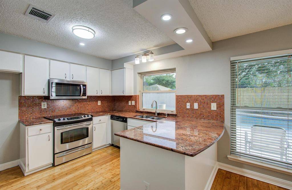 Glass tile Backsplash and Granite Countertops