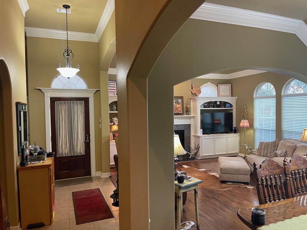 Fresh interior paint, engineered wood flooring, Hunter Douglas 2" white blinds, arched openings, bull nosed corners and move in ready.