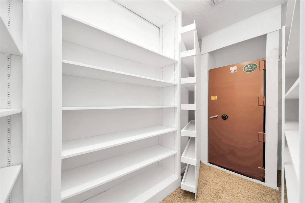 Game room closet with hidden safe