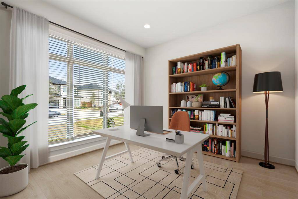 The study is quietly tucked away at the front of the home, making it a peaceful space. It features bright natural light, wood like flooring,and double glass French door entry. *This room has been virtually staged