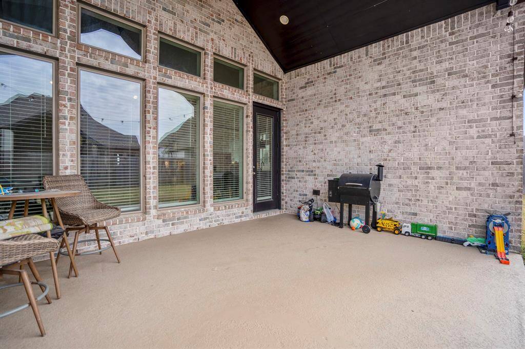 The covered patio is perfect for your outdoor living space, patio furniture, or BBQ pit! The french doors connect to the main living area making it great for indoor/outdoor living and entertaining.
