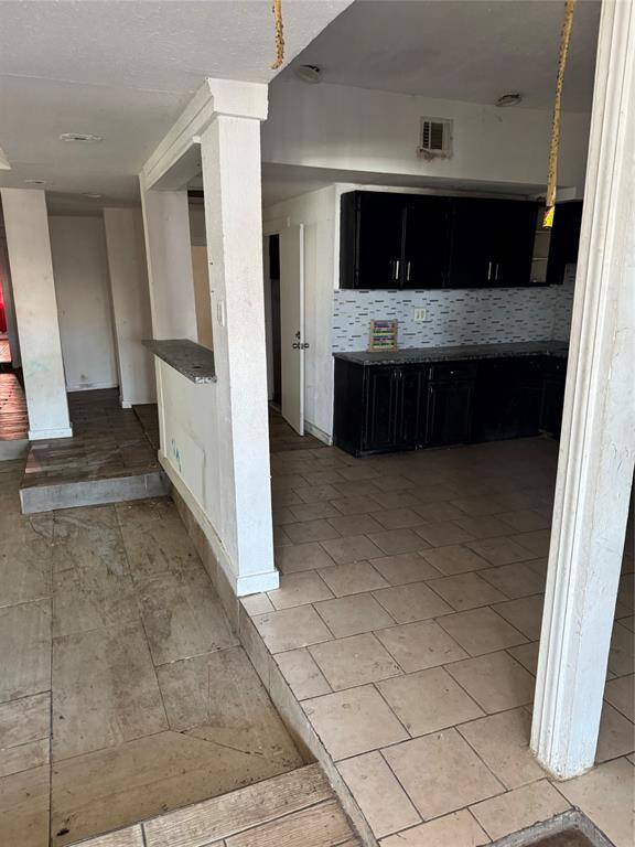 FIRST UNIT FRONT-KITCHEN/LIVING AREA