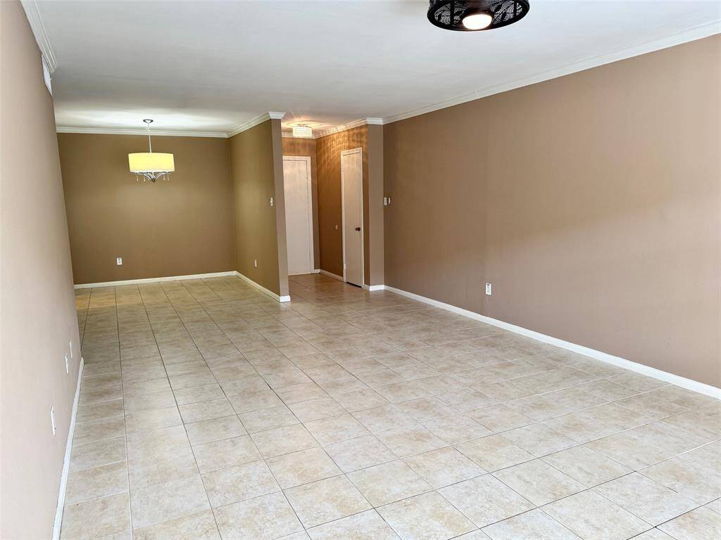 Living area (another perspective). The neutral pallette goes with any decor.
