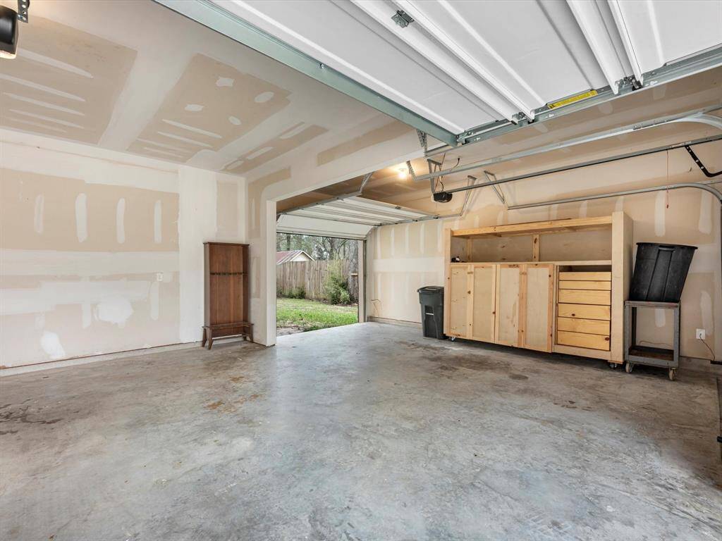3-Car Garage with Pass-through door in 3rd Bay and Custom Tool Center on Casters