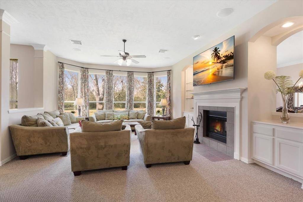 Living room with fireplace (also open to the dining room)