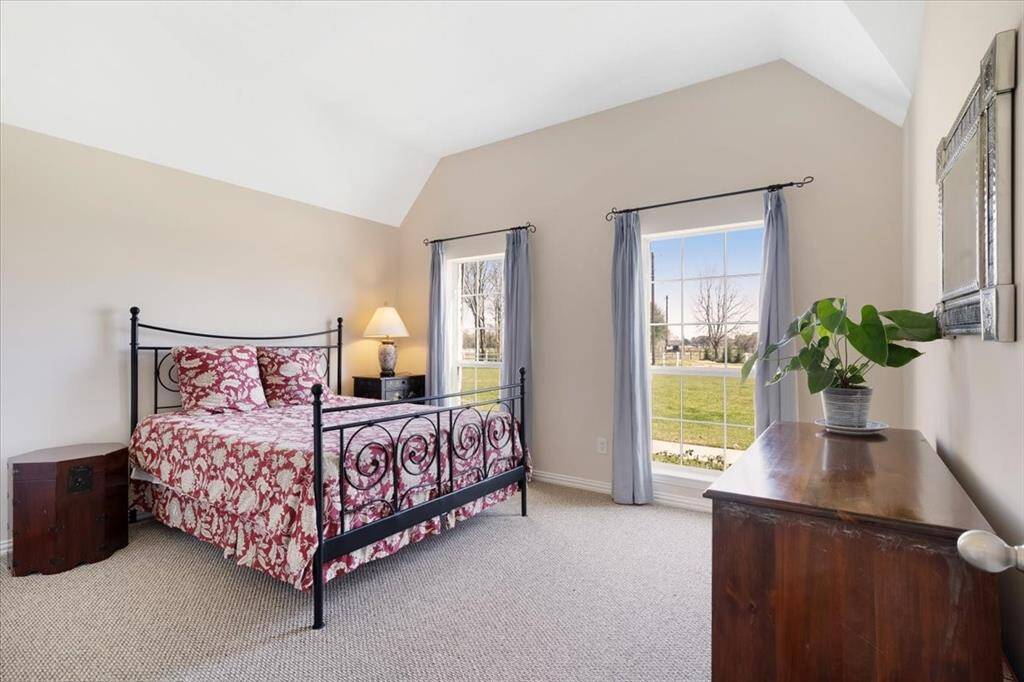 Secondary bedroom number two faces the front yard and has a large closet with two doors.
