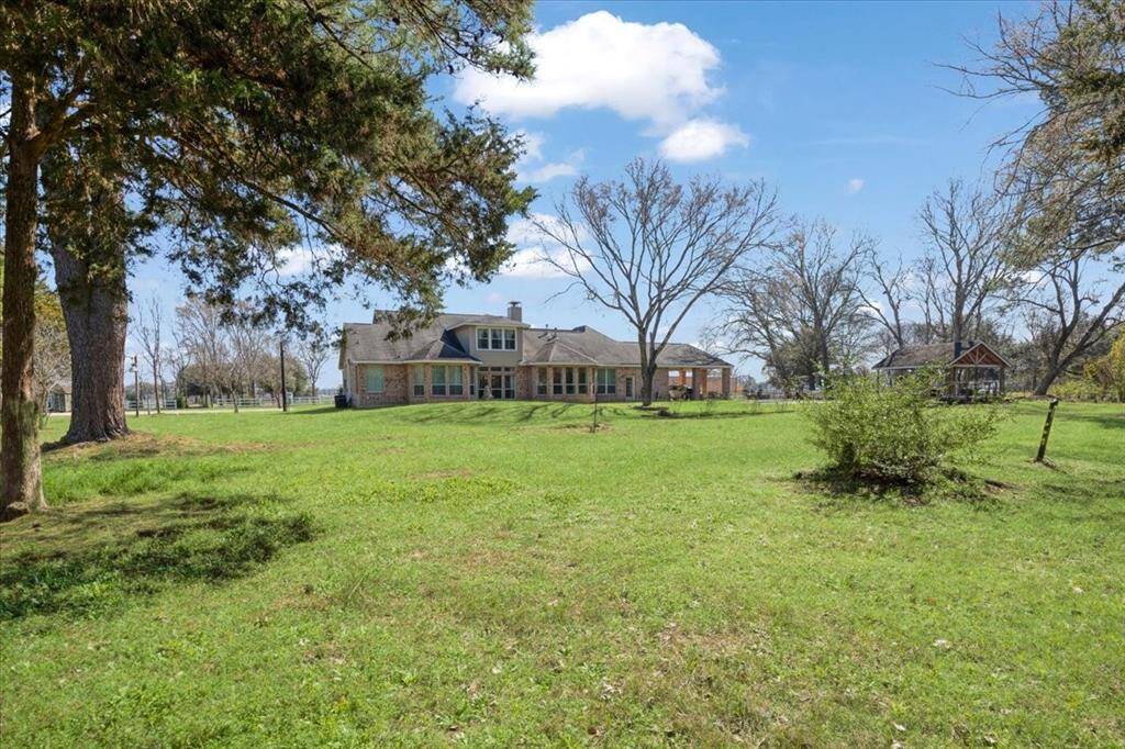 This is a view from the back left of the property (inside the wooded area)