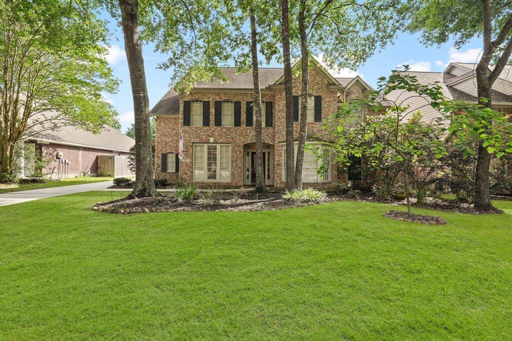 Trees, landscaping, and lush green grass welcome you home each day and provide excellent curb appeal.