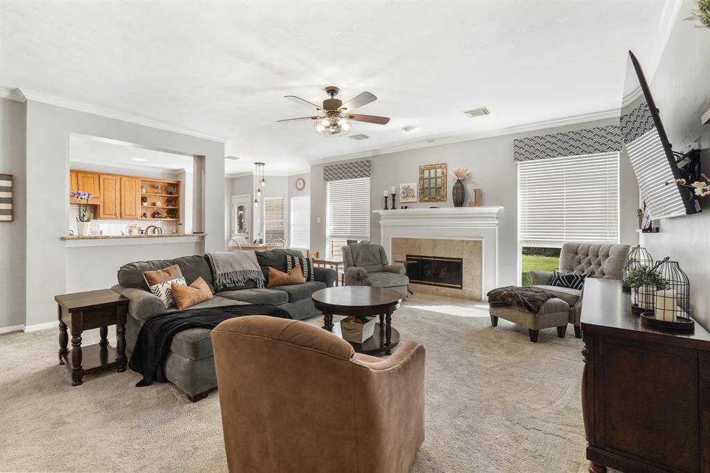 The architecture and design of the common living spaces provide a cohesive atmosphere. This photo is staged for photo purpose.