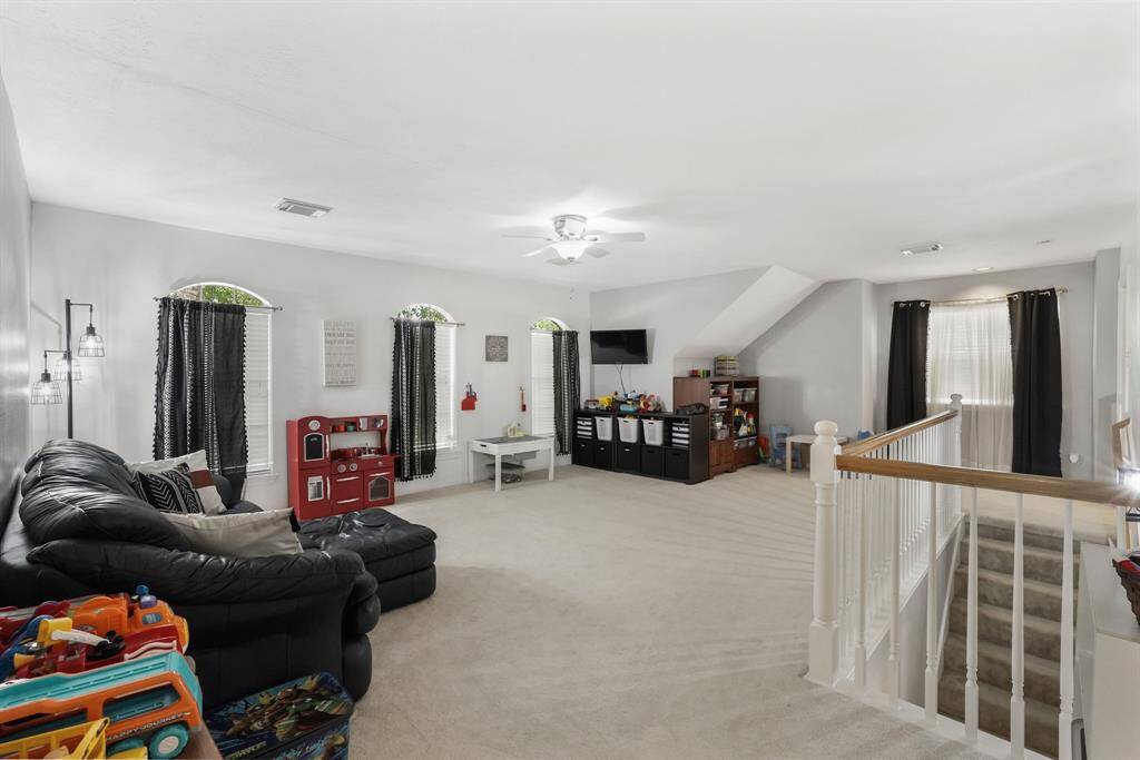 Surrounded by windows, the room offers plenty of views of the outdoors. Set up a sitting area, a game table, or maybe create a movie-watching space. The possibilities are endless. This photo is staged for photo purpose.