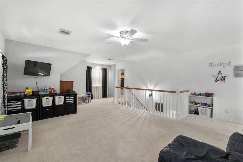 How will you utilize the spot to the right of the railing? It might make a great area for a desk or homework area.