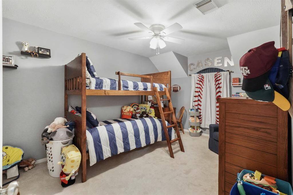Bedroom 2 is a wonderful space for play and relaxation. This photo is staged for photo purpose.