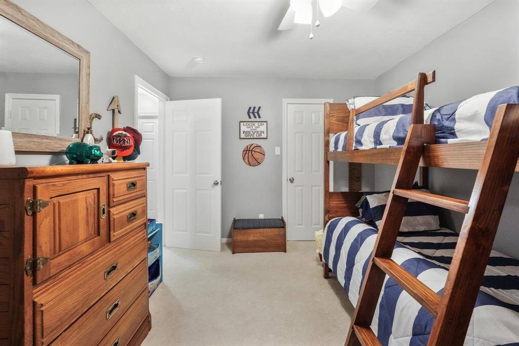 The bedroom closet is on the right side of the far wall. This photo is staged for photo purpose.